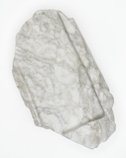 Top-down: light gray-green alabaster tray with gray streaks, light veining, beige flecks.